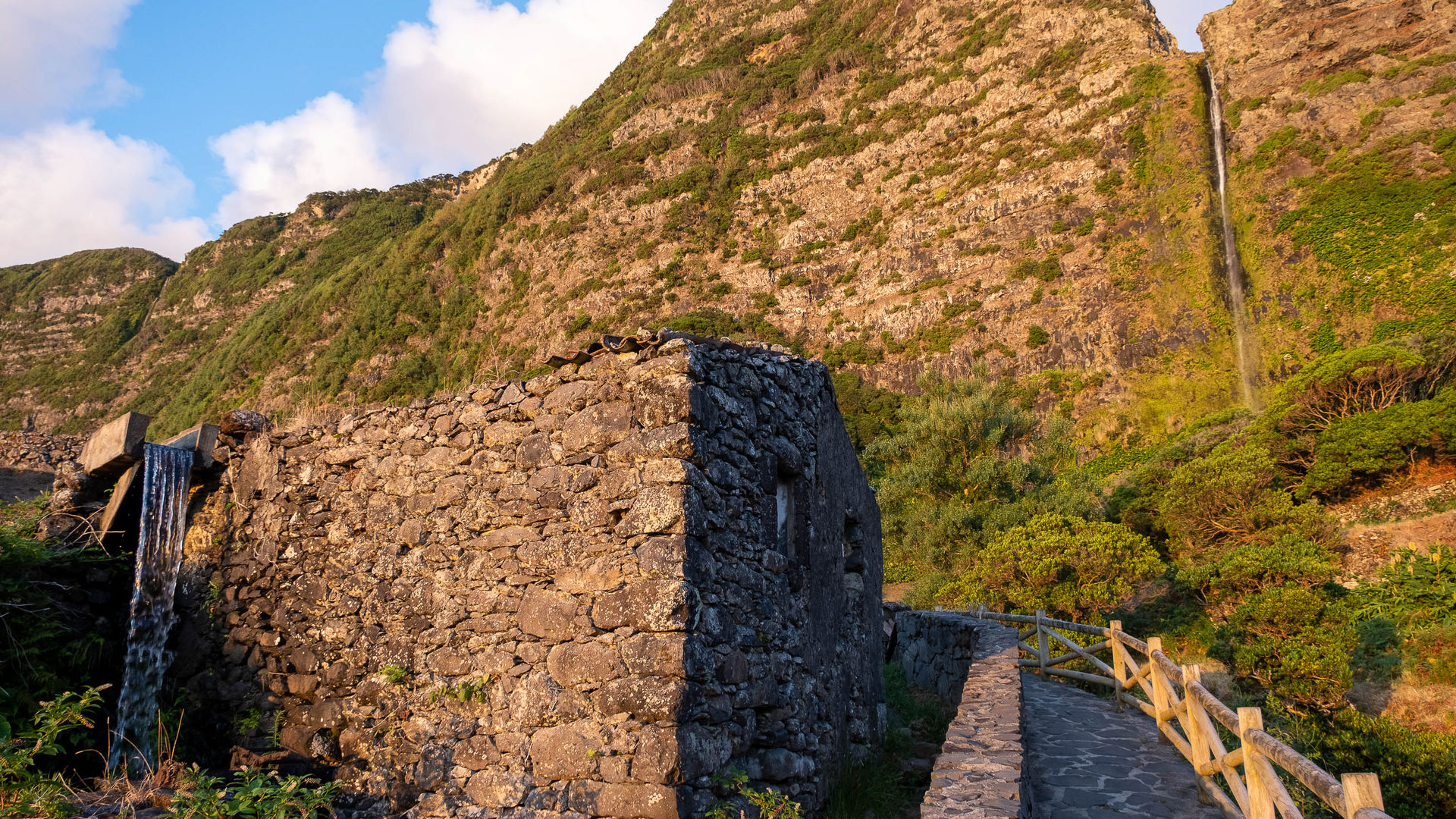 Hiking to the base of Poço do Bacalhau waterfall, Flores