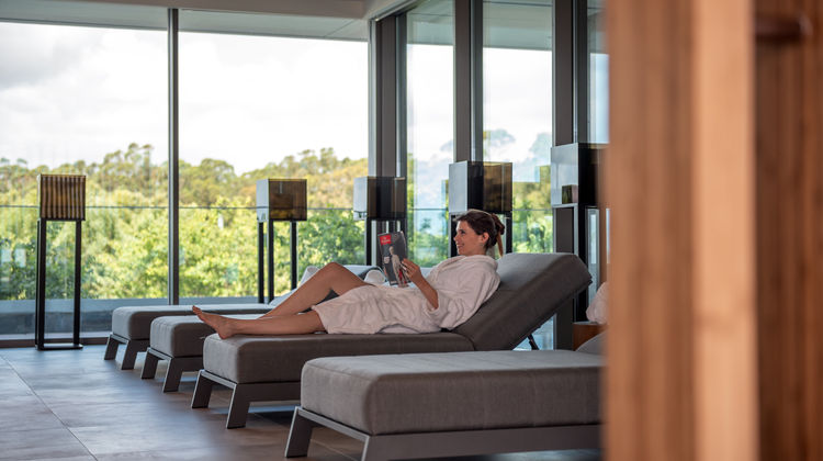 Stylish indoor lounge with floor-to-ceiling windows and scenic views at DoubleTree by Hilton Lagoa in the Azores