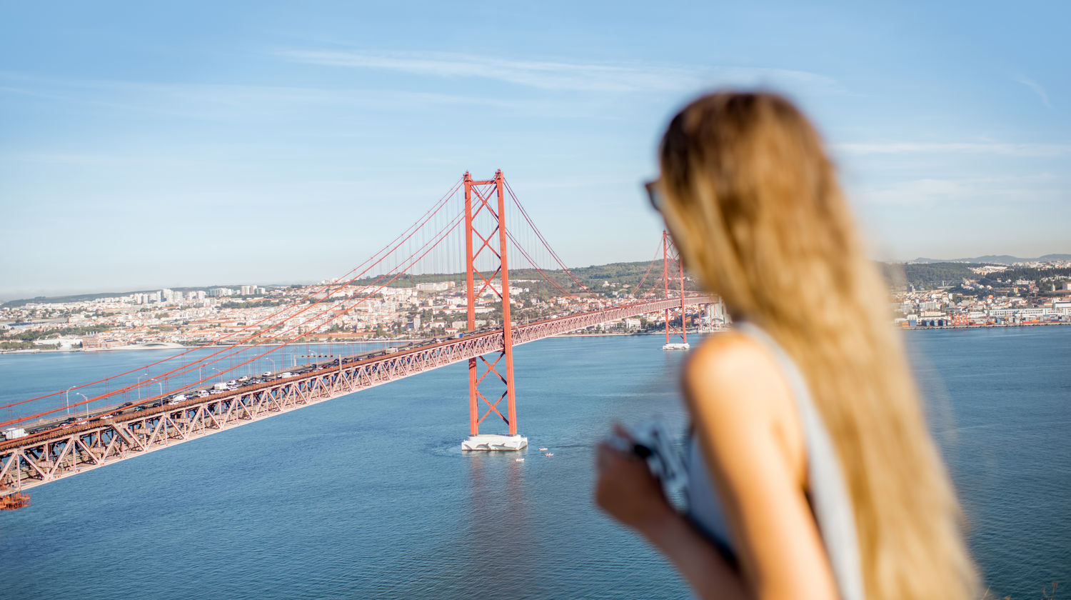 A Scenic Moment Above the Tejo River, Lisbon, Portugal Overlooking 25 de Abril Bridge,