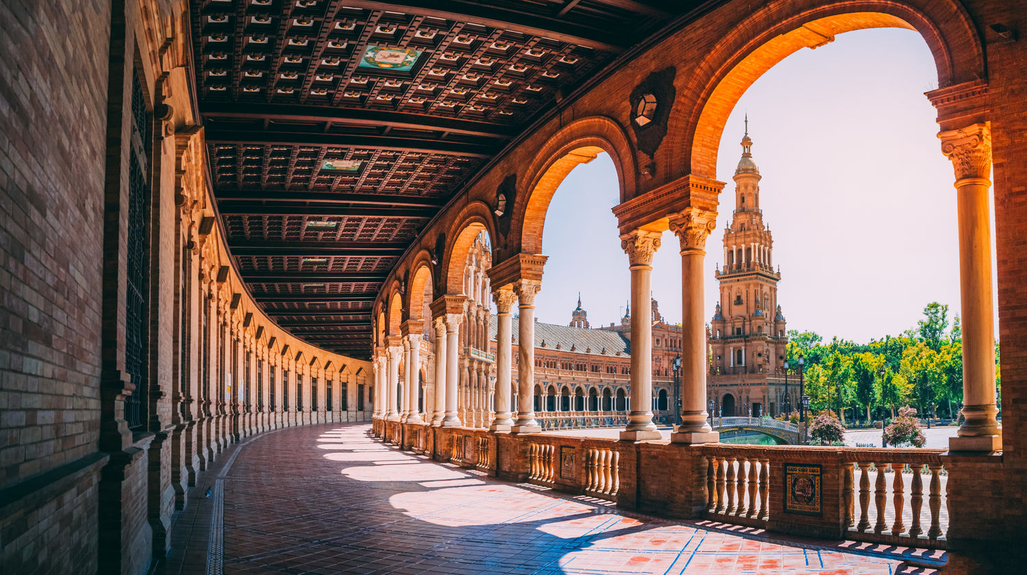 Golden Hour Along the Colonnades of Plaza de España, Seville, Spain