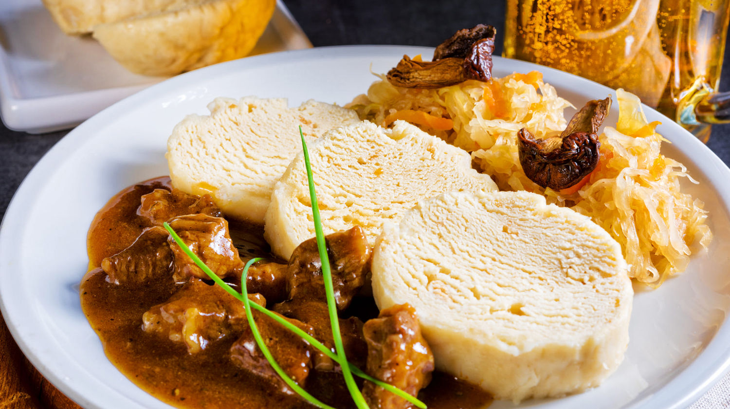 Goulash with traditional Czech bread dumplings (knedlíky)