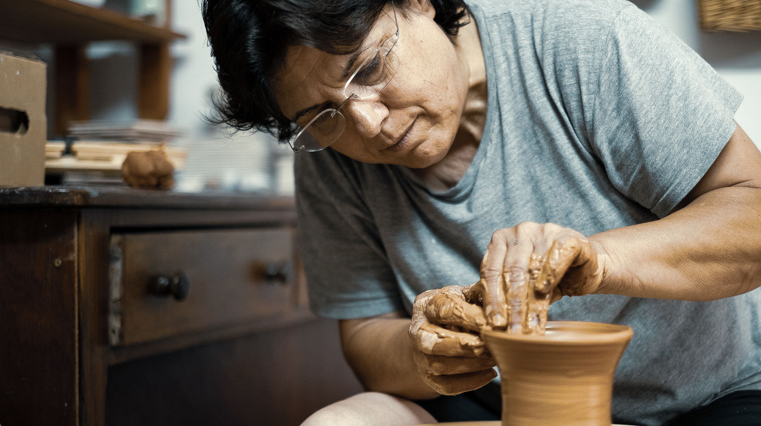 Artisan Shaping Clay by Hand in the Azores