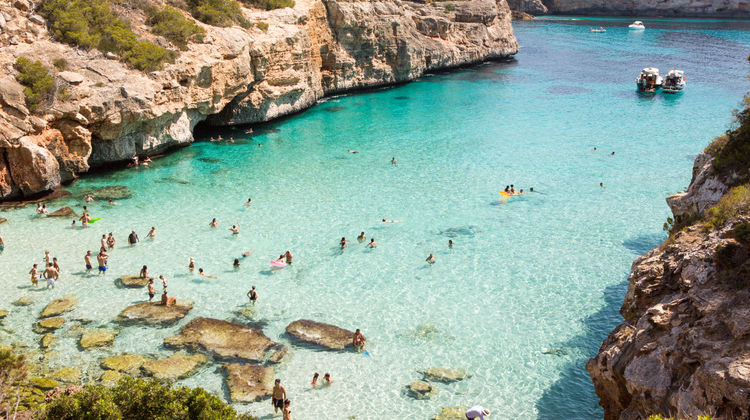 Swimming in Cala Llombards, Mallorca, Spain