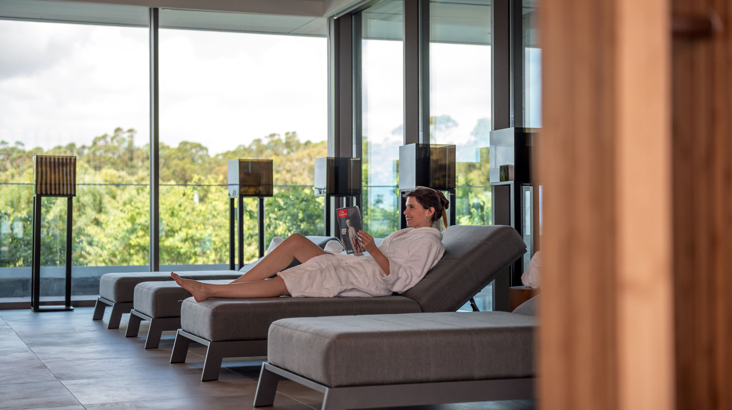 Stylish indoor lounge with floor-to-ceiling windows and scenic views at DoubleTree by Hilton Lagoa in the Azores