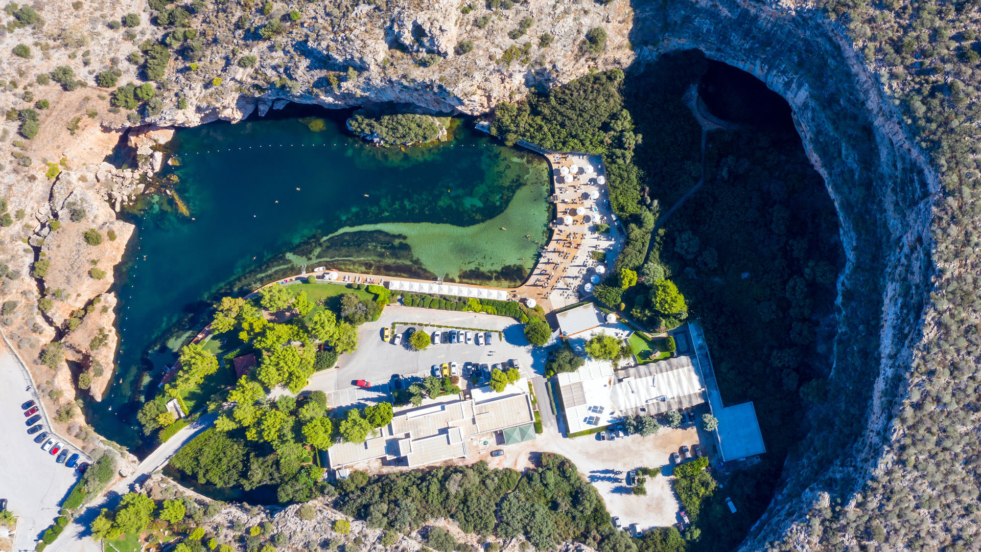 Relaxing by the Thermal Waters of Lake Vouliagmeni, Athens, Greece