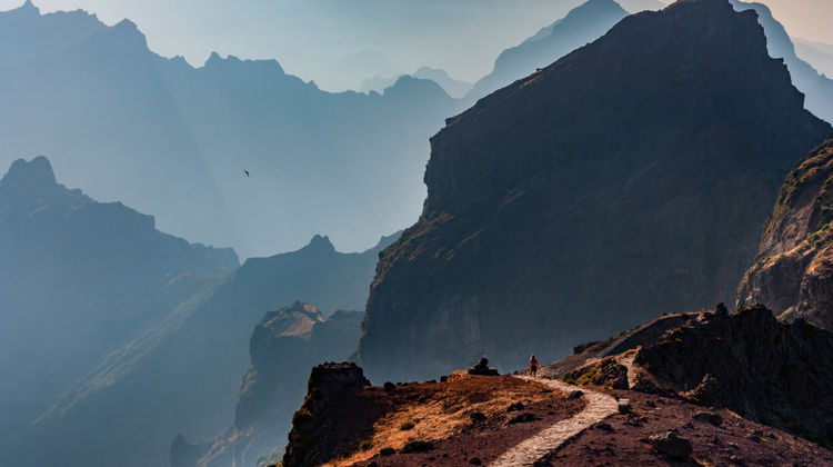View of Pico do Areeiro with dramatic mountain peaks and misty valleys on Madeira Island