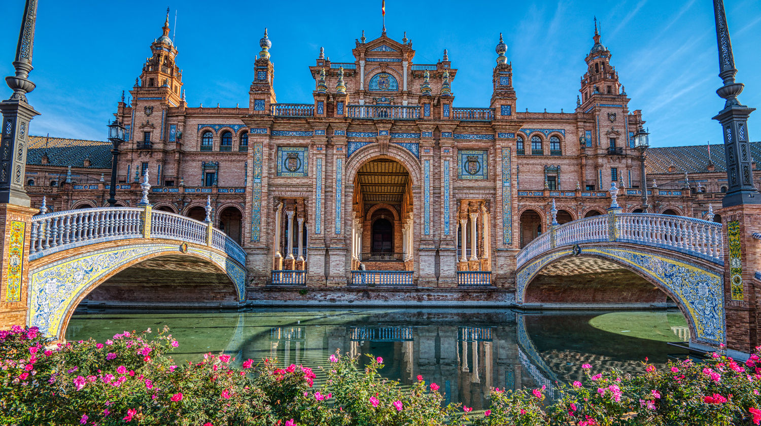 Strolling through Seville’s iconic Plaza de España, Spain