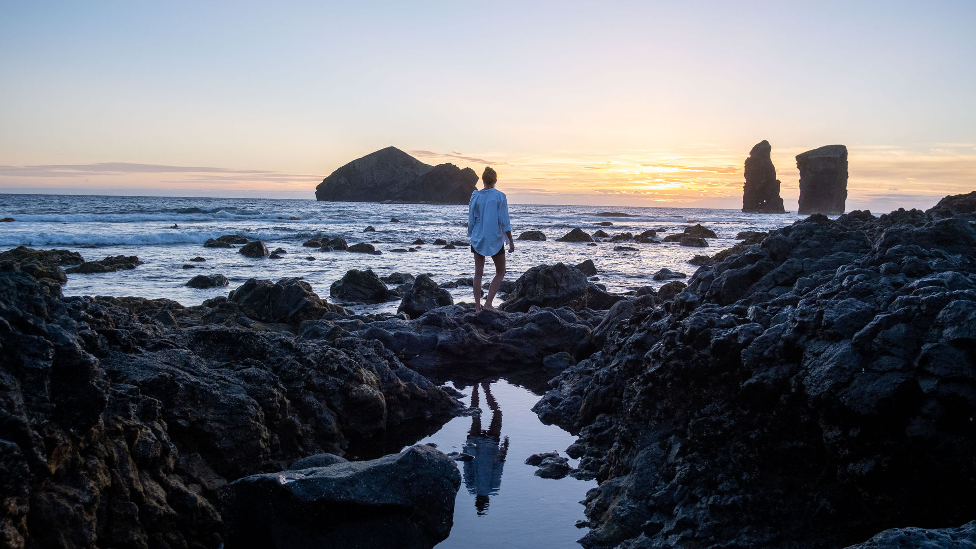 Sunset by the iconic rock formations of Mosteiros