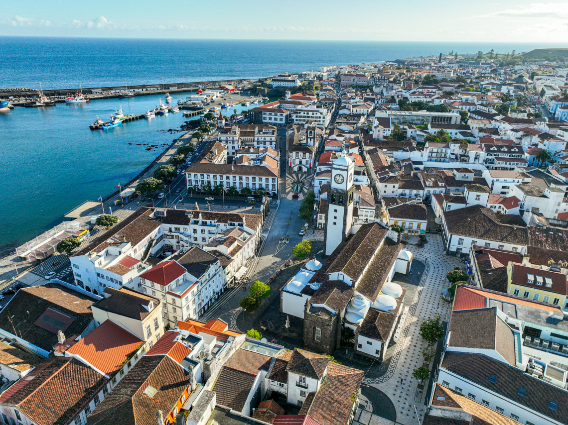Aerial view of Ponta Delgada historic city centre with the church tower, central square, and Atlantic Ocean waterfront, S&atilde;o Miguel Island, Azores