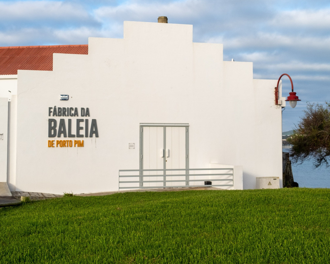 Exterior of the F&aacute;brica da Baleia de Porto Pim in Horta, a preserved former whaling factory documenting the history of the whaling industry on Faial Island.