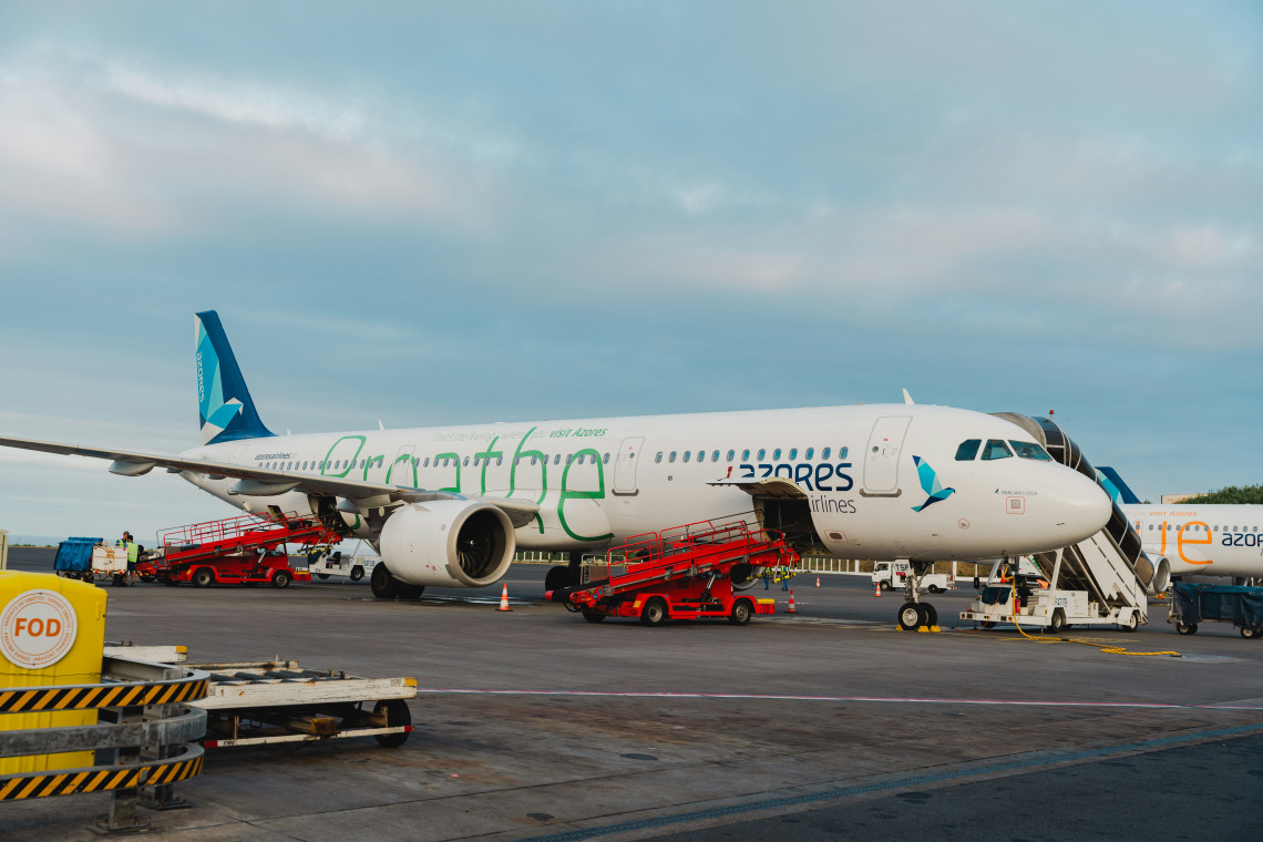 Azores Airlines aircraft parked at the airport on S&atilde;o Miguel Island, representing air travel and connections to the Azores archipelago.