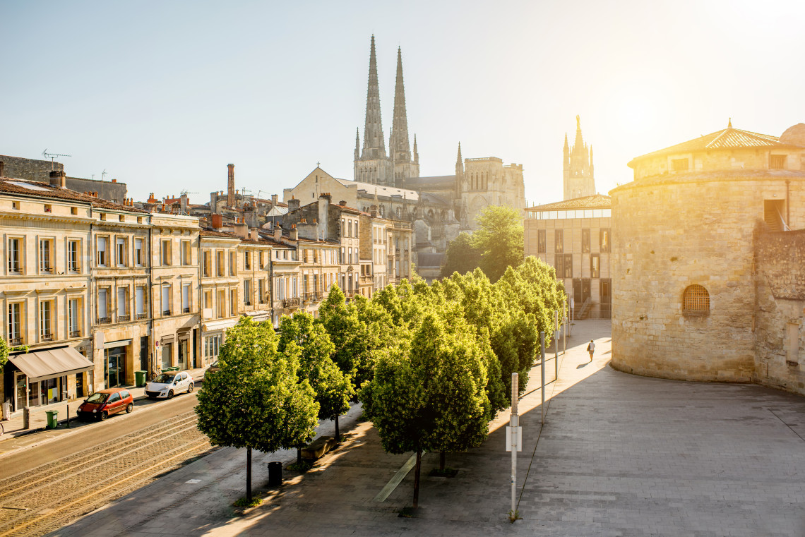 Elegant 18th-century stone facades along the waterfront of Bordeaux city, France