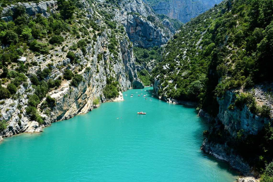 Panoramic view of the turquoise Verdon River winding through the limestone canyon of the Gorges du Verdon, France