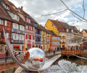 Woman with a mug at colmar christmas market, france, europe