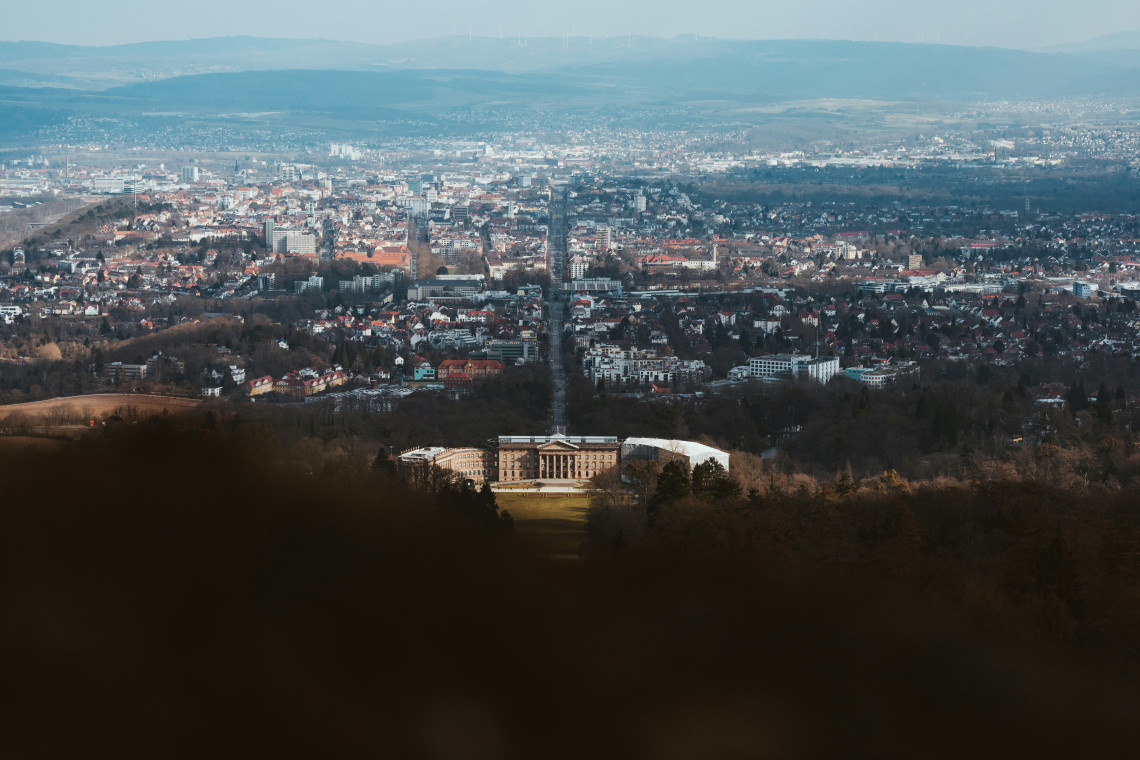 Panoramic view over Wilhelmsh&ouml;he Palace and the city of Kassel from the wooded slopes of Bergpark Wilhelmsh&ouml;he.